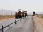 آغاز روکش آسفالت گرم 20 کیلومتر از راه های روستایی گرمسار و آرادان